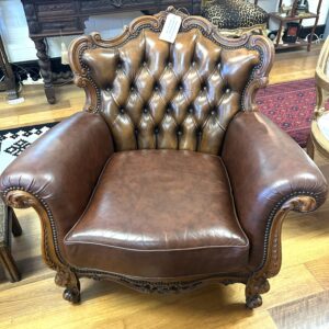 Carved walnut button back leather armchair with stud detail Italy circa 1960 (another available)